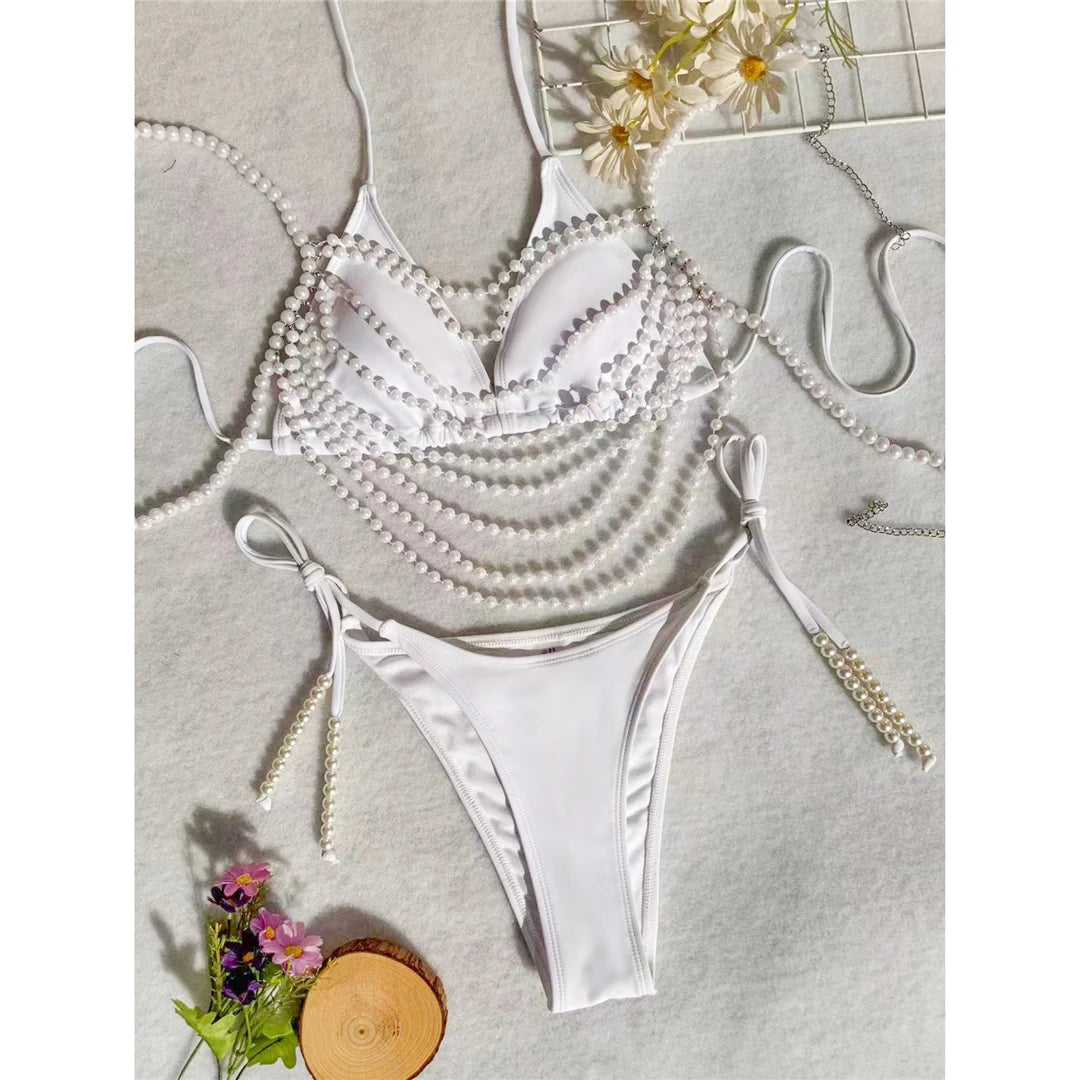Three Piece Halter Bikini Set Adorned with Pearls and Chains, High-Cut for a Flattering Fit, Sophisticated White Luxury Swimwear, Nylon and Spandex, Solid Pattern, Low Waist, Women's Wire Free Bikini that Fits True to Size, Available Sizes: S to XL