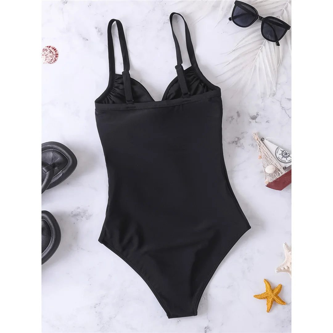 V-neck knotted high-cut leg one-piece swimsuit with padded support and elegant black design for women.
