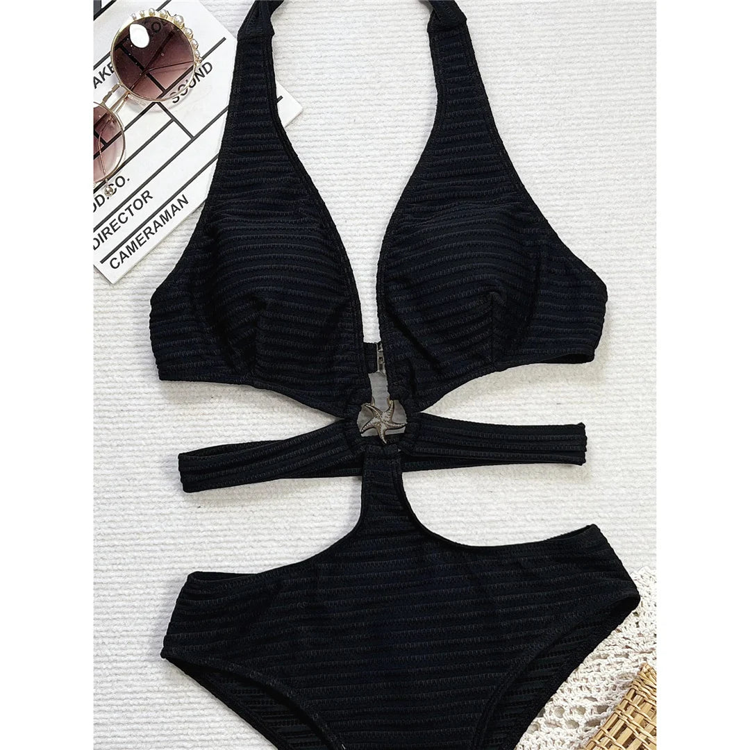 V neck cut-out halter ribbed monokini in solid black with high cut design and adjustable straps for an elegant and confident beach look.