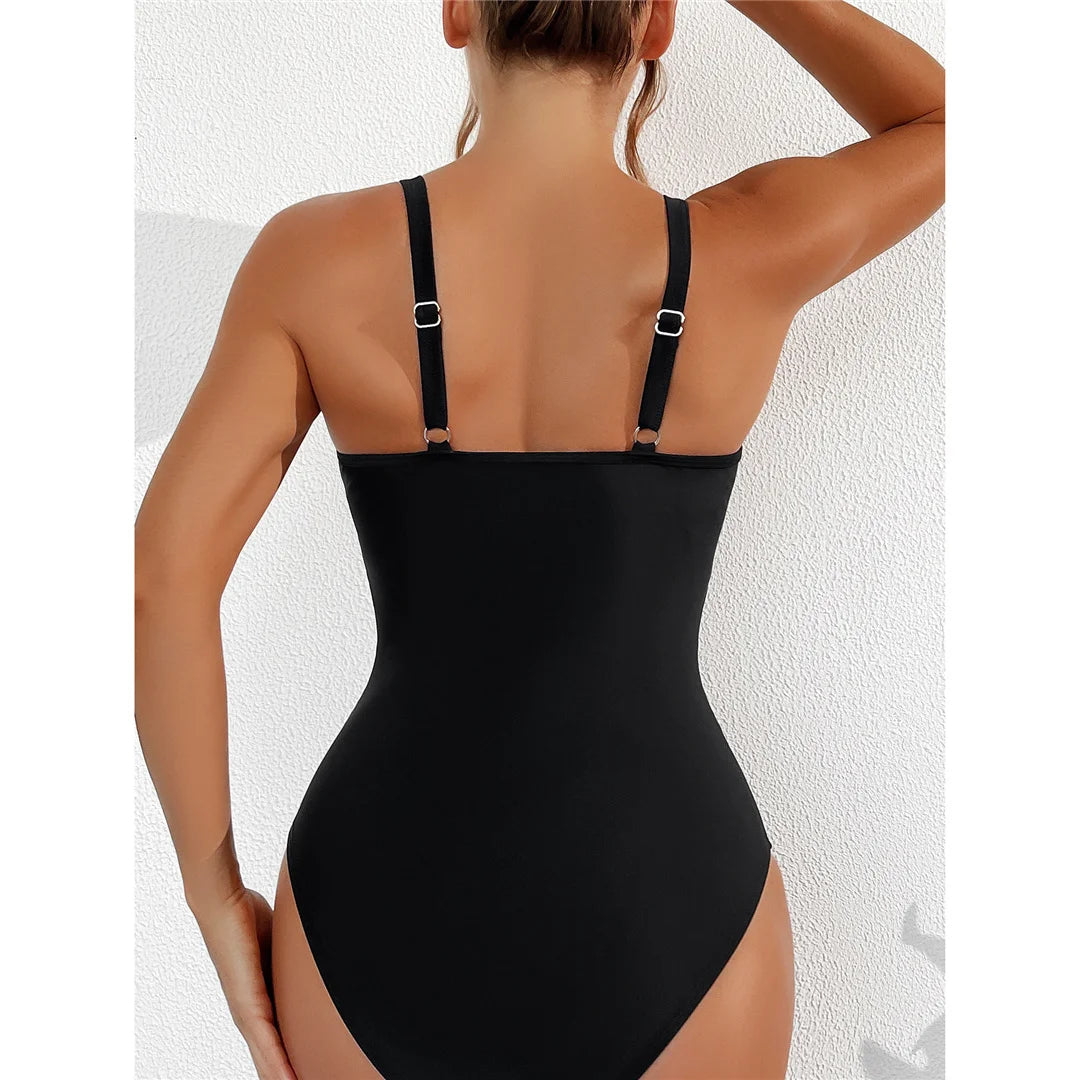 Mesh Sheer V Neck Leopard Printed One Piece Swimsuit erhältlich in den Größen S bis XL. Dieser einteilige Badeanzug oder Monokini aus Nylon und Elasthan ist mit durchsichtigen Mesh-Details und einem auffälligen Leopardenprint versehen. Mit seinem tiefen V-Ausschnitt und der schmeichelhaften Silhouette ist er perfekt, um am Pool oder am Strand einen auffälligen Eindruck zu hinterlassen. Erhältlich in Schwarz, Tiefblau, Pink, Rot, Weiß, Dunkelgrün, Grün, Blätter, Leopard und Multicolor.
