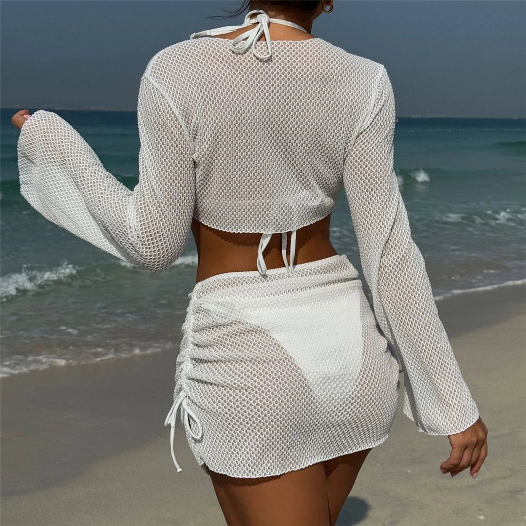 Long sleeve halter bikini four-piece set for women with chic mix-and-match options, including solid low waist design and matching skirt.