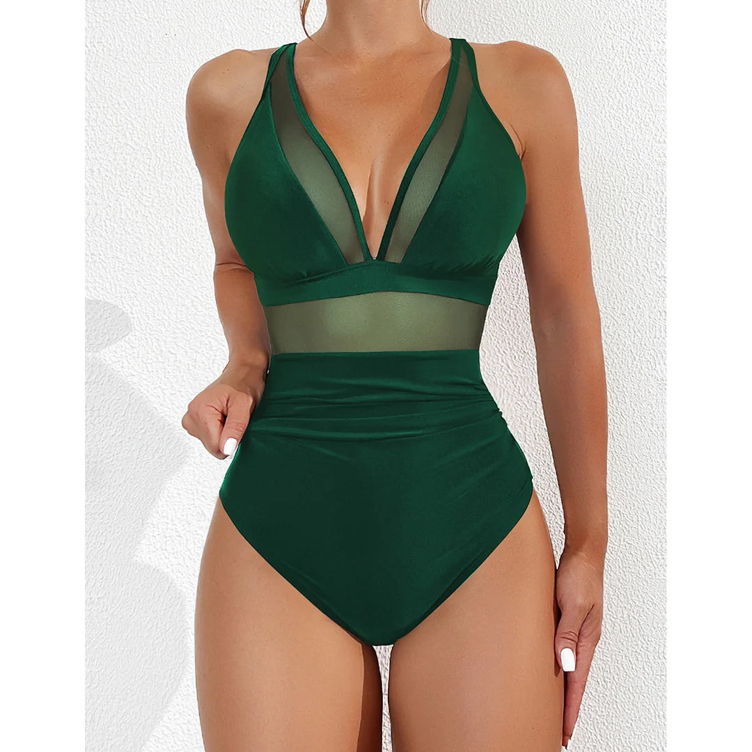 Mesh Sheer V Neck Leopard Printed One Piece Swimsuit erhältlich in den Größen S bis XL. Dieser einteilige Badeanzug oder Monokini aus Nylon und Elasthan ist mit durchsichtigen Mesh-Details und einem auffälligen Leopardenprint versehen. Mit seinem tiefen V-Ausschnitt und der schmeichelhaften Silhouette ist er perfekt, um am Pool oder am Strand einen auffälligen Eindruck zu hinterlassen. Erhältlich in Schwarz, Tiefblau, Pink, Rot, Weiß, Dunkelgrün, Grün, Blätter, Leopard und Multicolor.
