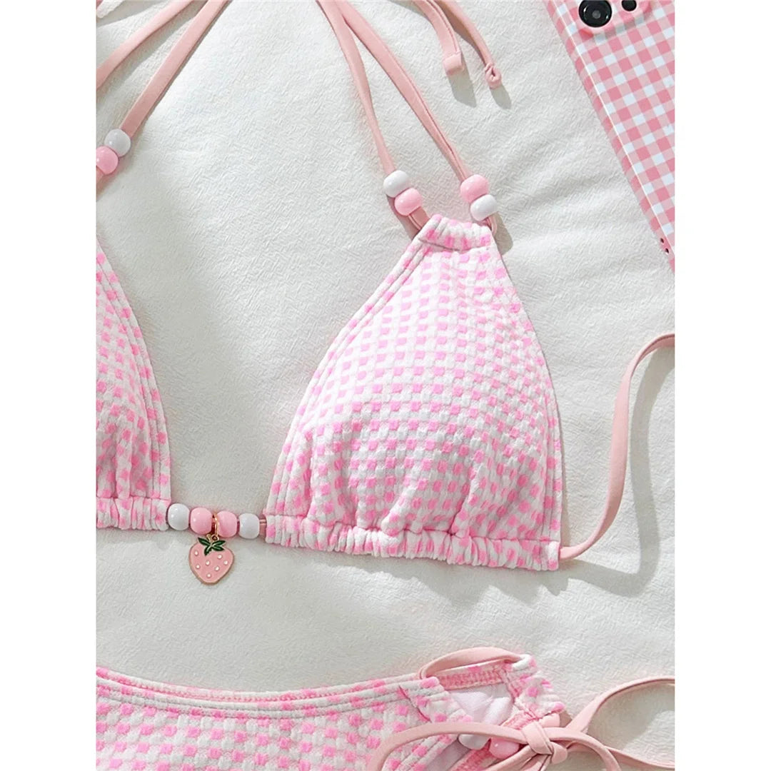 Plaid halter high-cut leg bikini set with a timeless plaid pattern and padded design for women.