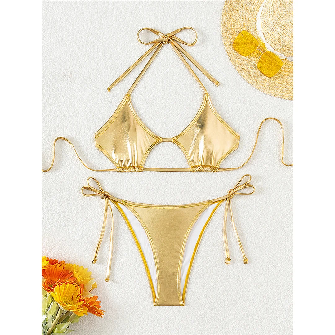 Seductive Halter Cut-Out Bikini Set for Women, Crafted from PU Faux Leather, Two-Piece Swimsuit, Exudes a Fierce and Edgy Appeal, Fits True to Size, Available in Sizes S to XL, Material: Nylon and Spandex, Solid Pattern, Low Waist, Wire Free, Shiny Gold, Perfect for a Beach to Poolside Statement, Comes with Padding