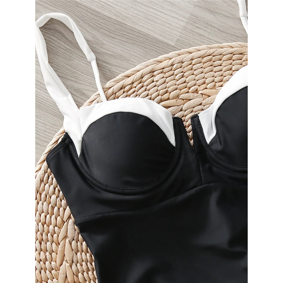 Splicing design high-leg cut one-piece swimsuit with underwired and padded support in vibrant colors for women.