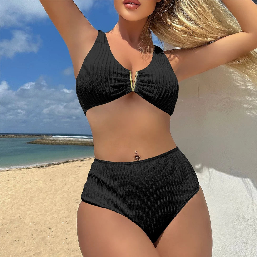 Step into summer with our V Shaped Wrinkled High Waist Bikini Set in Black, Army Green, and White. This two-piece swimsuit made from nylon and spandex features a unique V-shaped design with a textured, wrinkled finish. The flattering high waist bottom and wire-free top with pad fit true to size. Merging contemporary style with classic comfort, this bikini set is an essential addition to any women's swimwear collection.