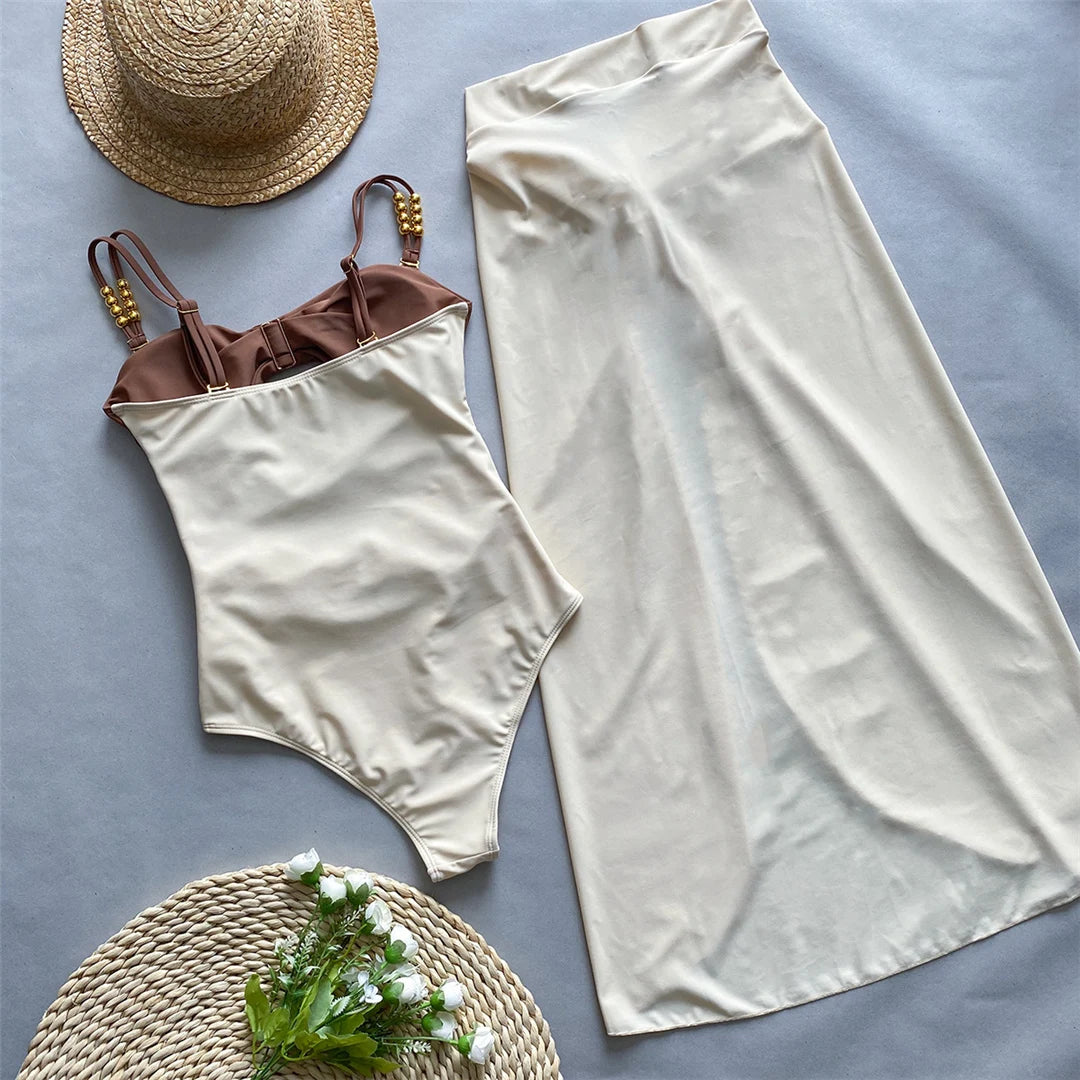 Splicing Cut Out One Piece Swimsuit mit geknotetem Rock, Falten Textur Monokini, aus Nylon und Elasthan, Patchwork-Muster, Wire-Free Unterstützung, True to Size, Damen-Badebekleidung, kommt mit Polsterung, Erhältlich in den Größen klein, mittel, groß und extra groß, Farben verfügbar: Grün, Schwarz, Rosa, Braun, Multicolor, Kostenloser Versand.