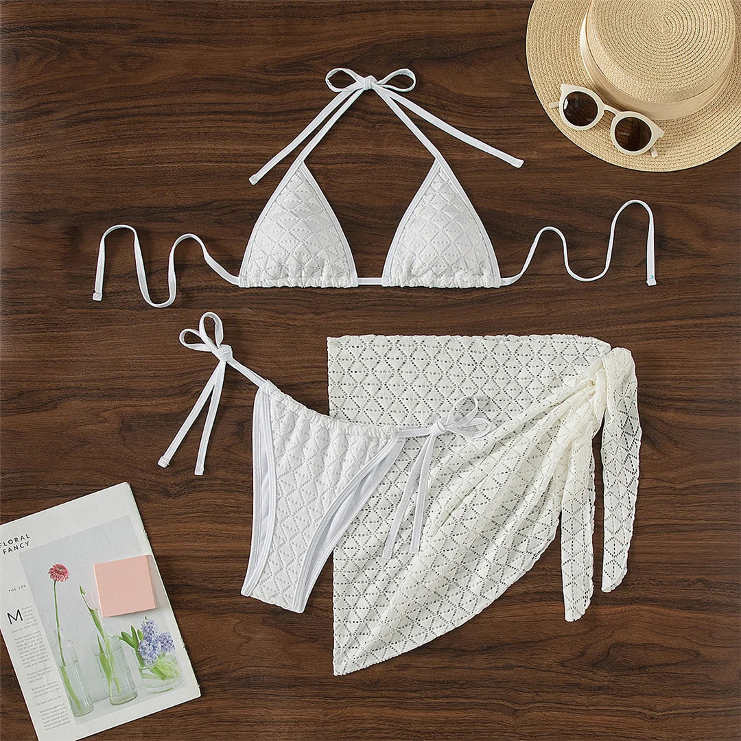 Stylish Three-Piece Halter Wrinkled Bikini Set with versatile Sarong, Textured Beachwear in White, Low Waist and Wire Free design, Snug and Flattering Fit from XS to L for Women, Comfy Nylon and Spandex Swimwear for Fashion-Conscious Adults