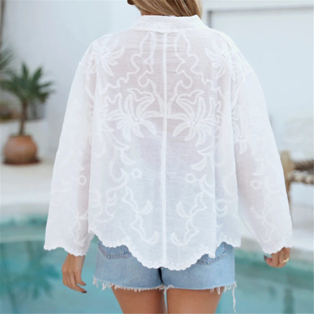 Embroidery white long sleeve shirt top as a chic beach cover-up with intricate details for women.