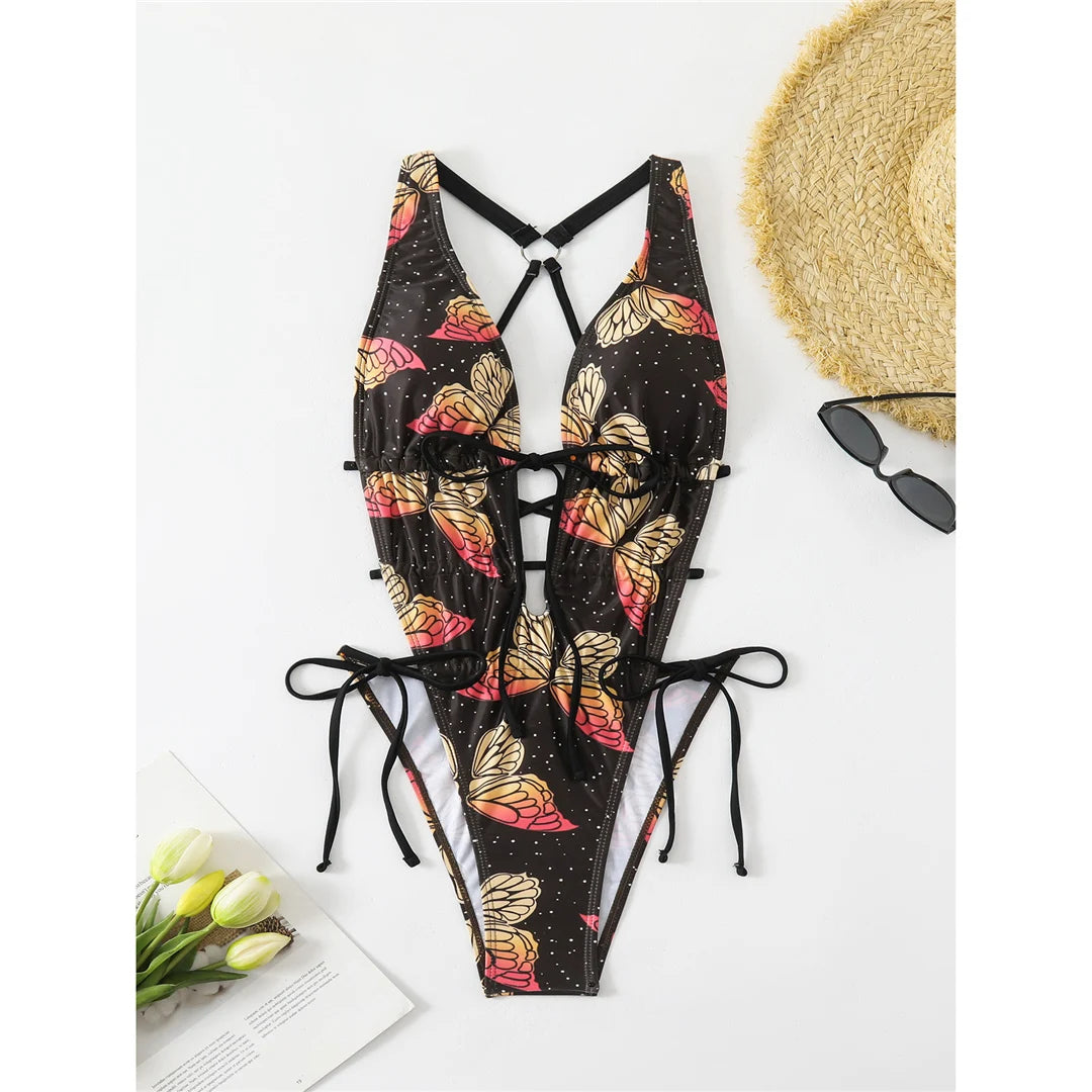 Butterfly printed deep V neck backless one piece swimsuit with high cut silhouette and adjustable straps for women.