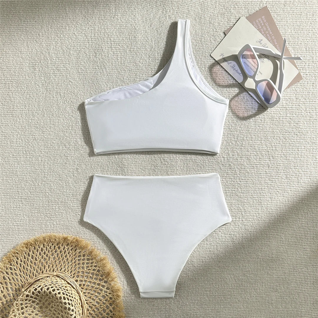 Wrinkled one-shoulder high waist bikini set, distinctive design, polyester spandex blend, wire-free support, women's solid two-piece swimwear, modern elegance and comfort.