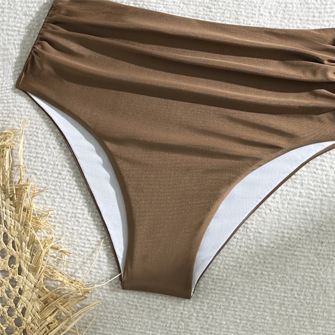 Wrinkled one-shoulder high waist bikini set, distinctive design, polyester spandex blend, wire-free support, women's solid two-piece swimwear, modern elegance and comfort.