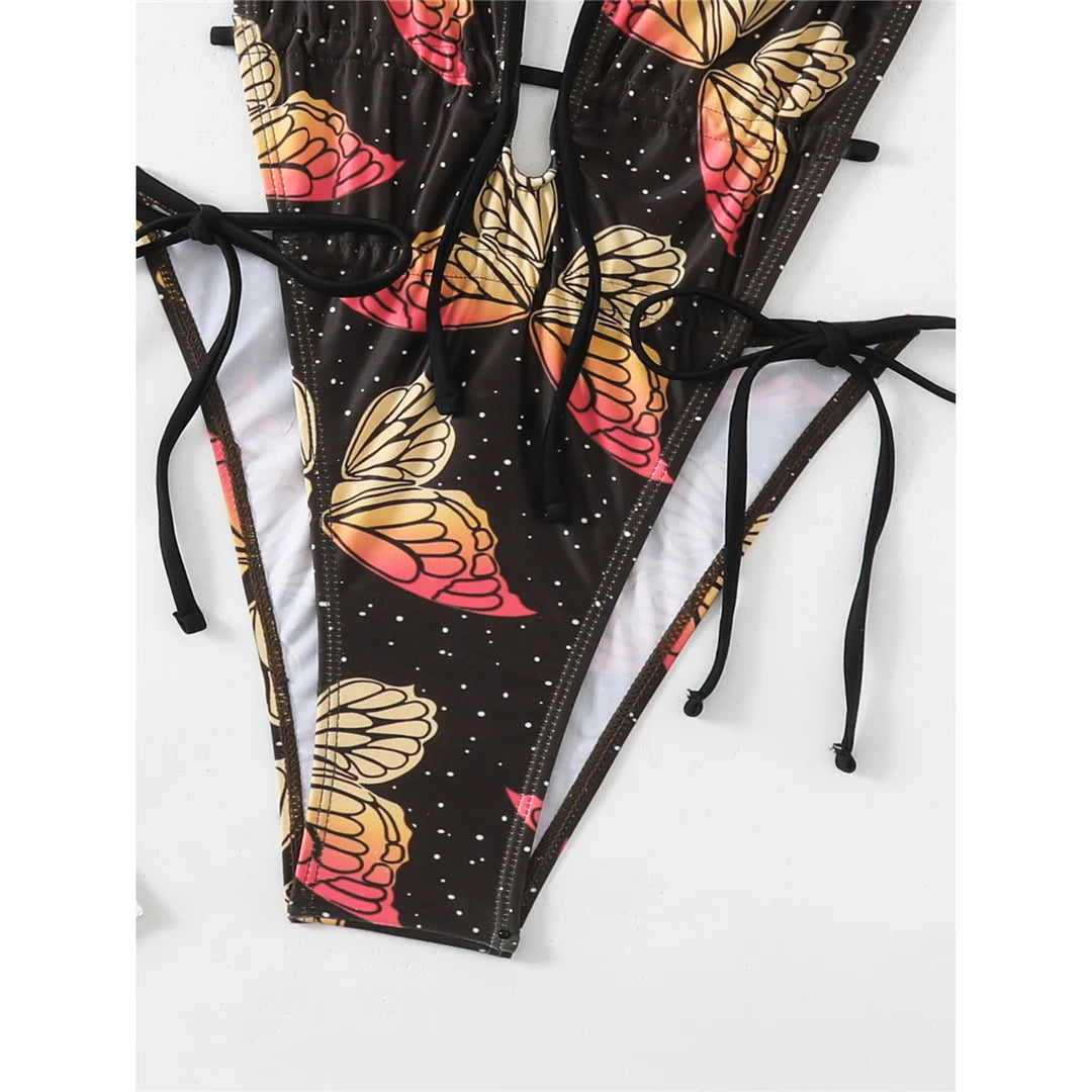 Butterfly printed deep V neck backless one piece swimsuit with high cut silhouette and adjustable straps for women.