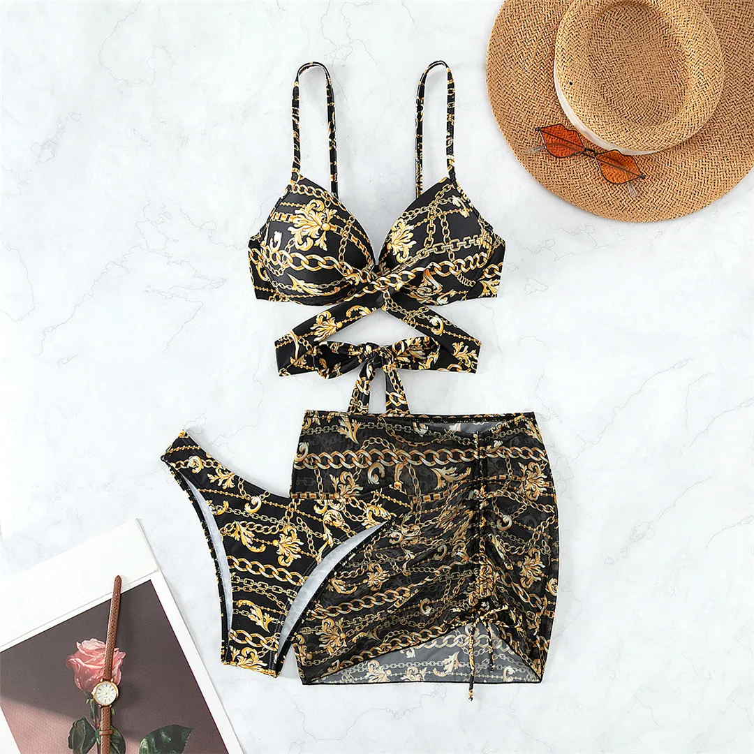 Stylish Printed Bikini Set with Coordinating Skirt for Women, Three Piece Swimwear with Underwire for Support, Made of Nylon and Spandex, Fits True to Size, Perfect for Beachfront Strolls or Lounging by the Water, Available in Sizes S, M, and L, Unique Low Waist Design, Comes in Classic Black Color