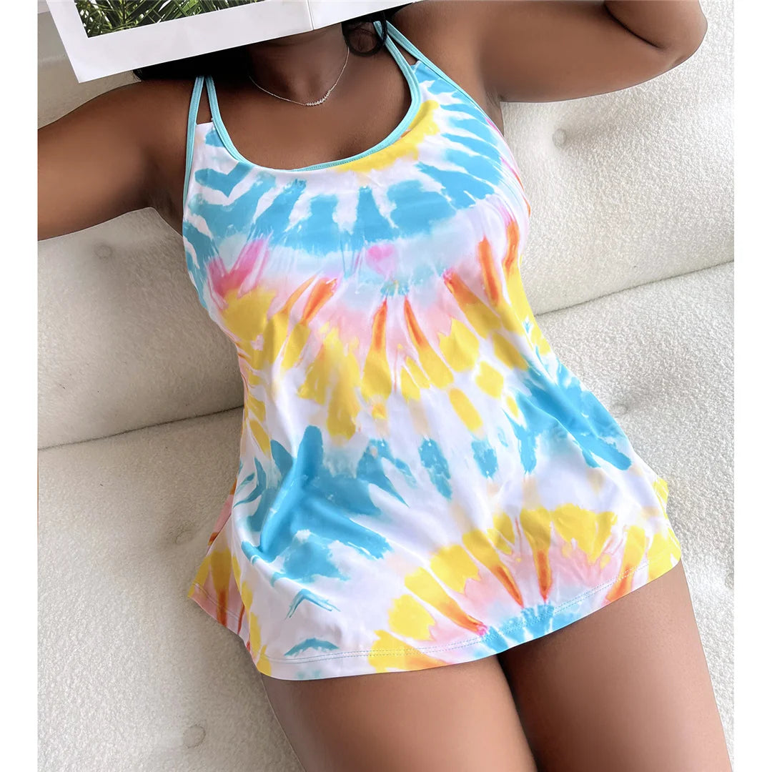 Ensemble bikini deux pièces tie-dye pour femmes, tailles allant de 0XL à 4XL. Idéal pour celles qui recherchent un look élégant à la plage ou à la piscine, ce bikini à taille haute associe un design branché à une coupe confortable. Fabriqué en nylon et spandex très extensibles, il est doté d'un soutien et d'un rembourrage sans fil. Disponible en violet et en bleu lac pour toutes les saisons de natation à la mode.