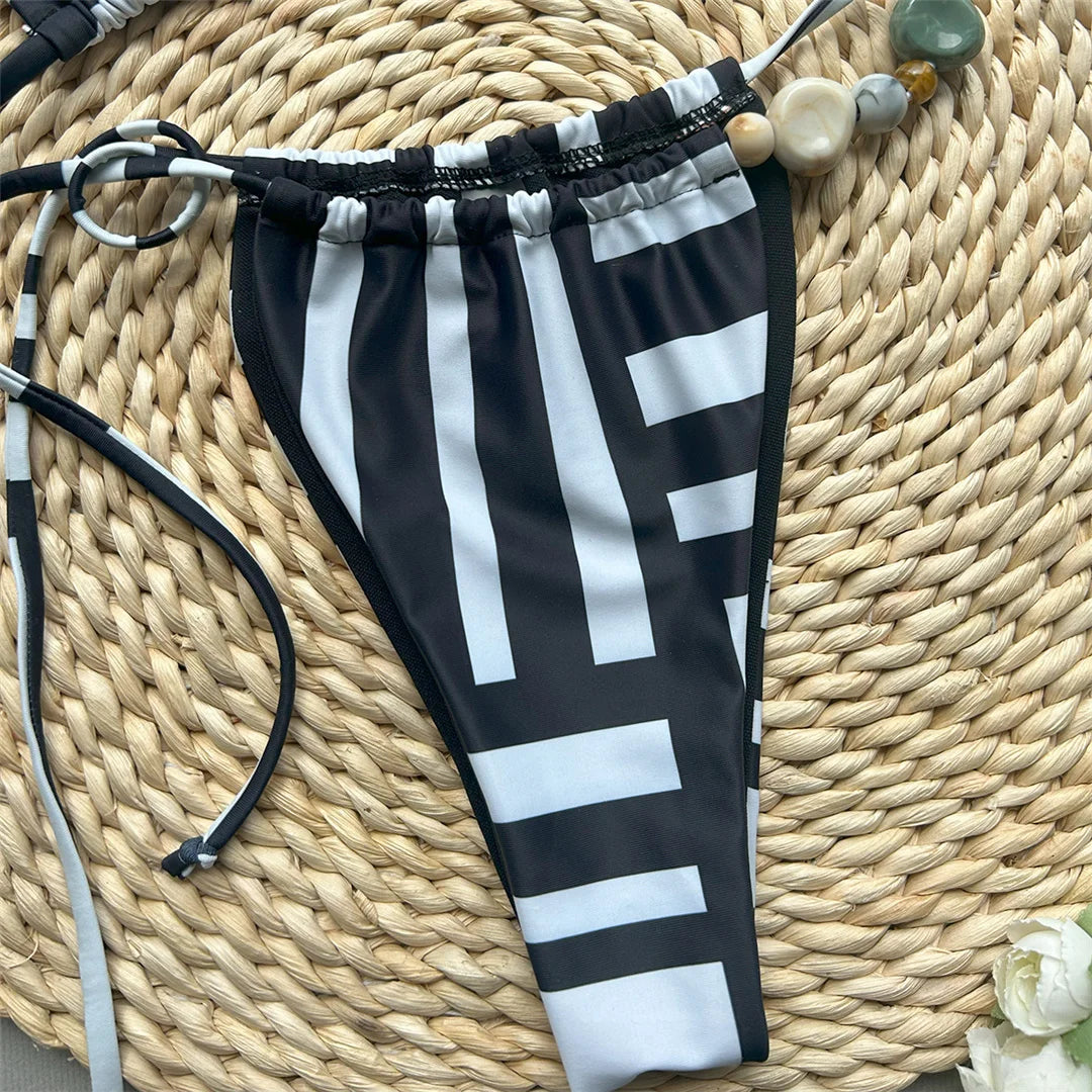 Halter striped high leg bikini set with padded design for a chic and nautical look for women.