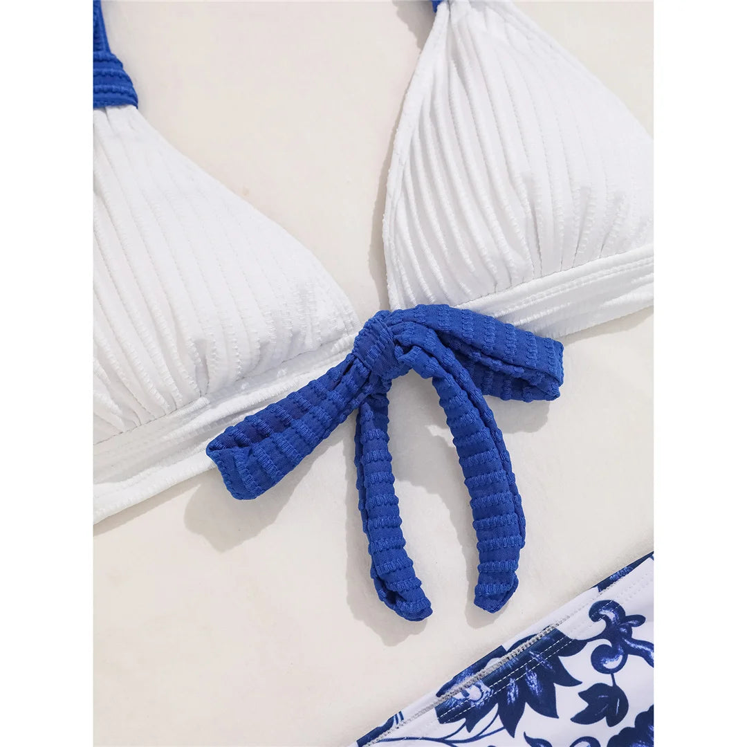 Floral Halter High Waist Bikini Set with vibrant prints, chic halter top, high waist bottoms, polyester and spandex blend, perfect for elegant beach style.