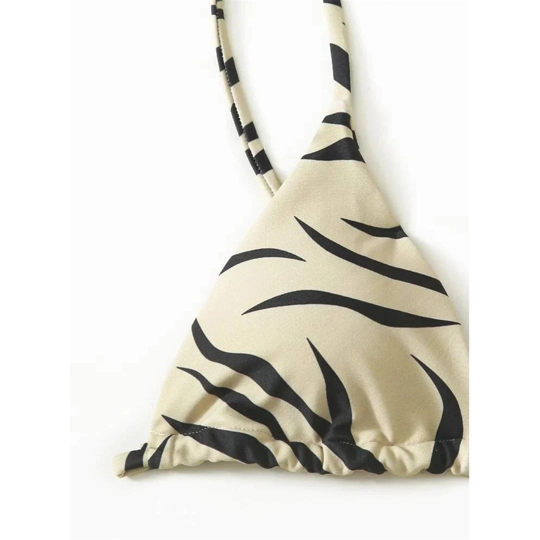 Daring Zebra Printed High Cut Bikini Set for Women in Sizes S to XL, Made of Nylon and Spandex, Wire Free for Comfort, Fits True to Size, Fashion Forward Two-Piece Design with Low Waist, Striking Zebra Print for Edgy Elegance, Available in Colors Beige, Black, Khaki, Green, Pink, Purple, and Red