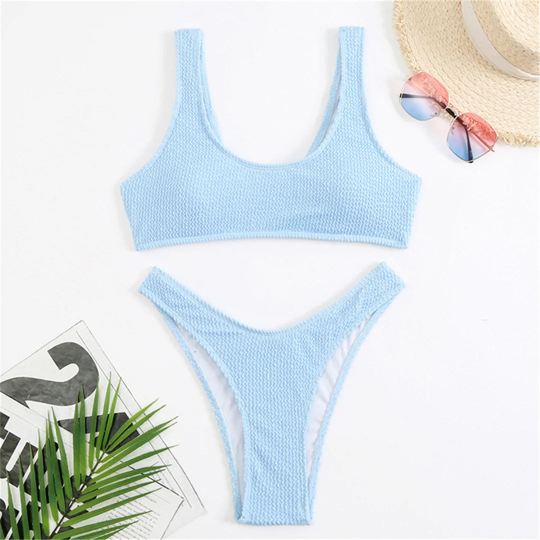High cut bikini set in eight colors with wrinkled crinkled texture and solid design for a chic and flattering fit.