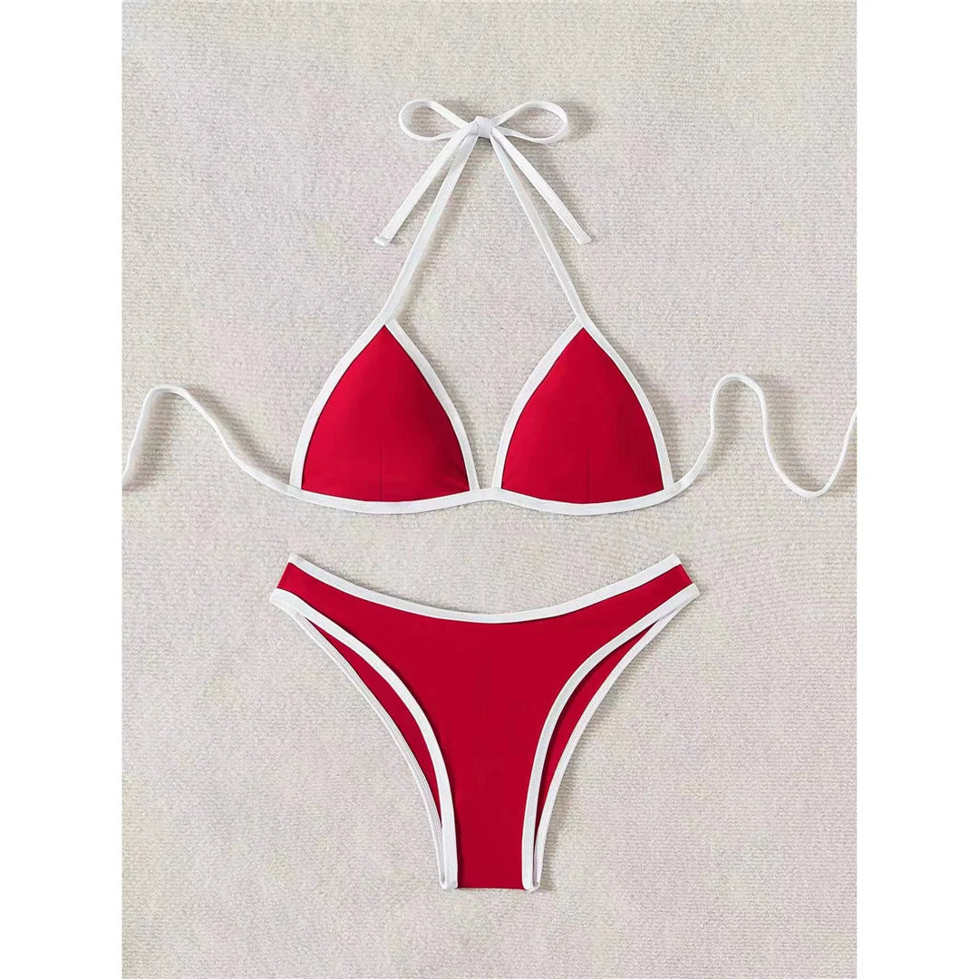 Halter Brazilian high cut bikini set in solid red with padded design for a confident and fashionable beach look.