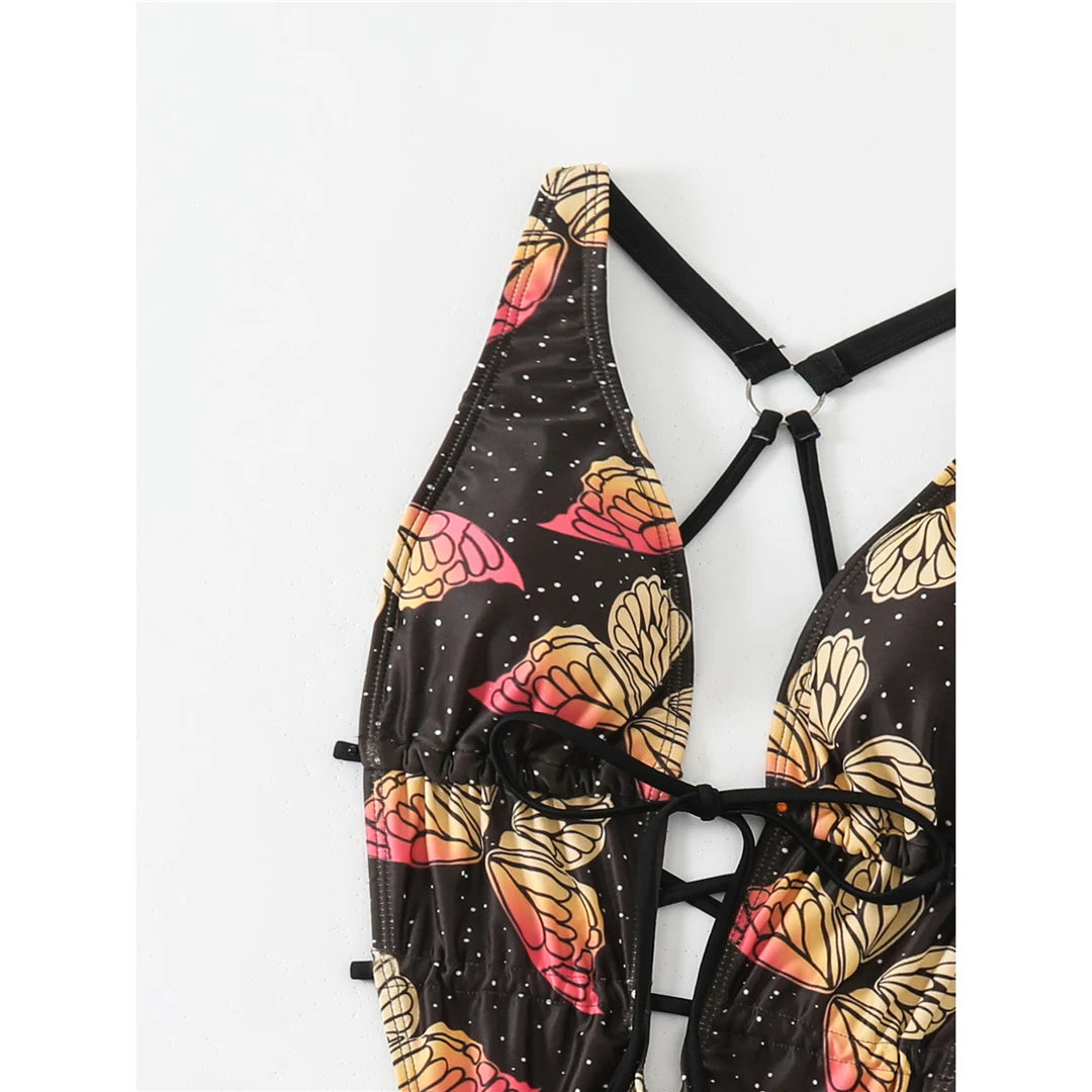 Butterfly printed deep V neck backless one piece swimsuit with high cut silhouette and adjustable straps for women.