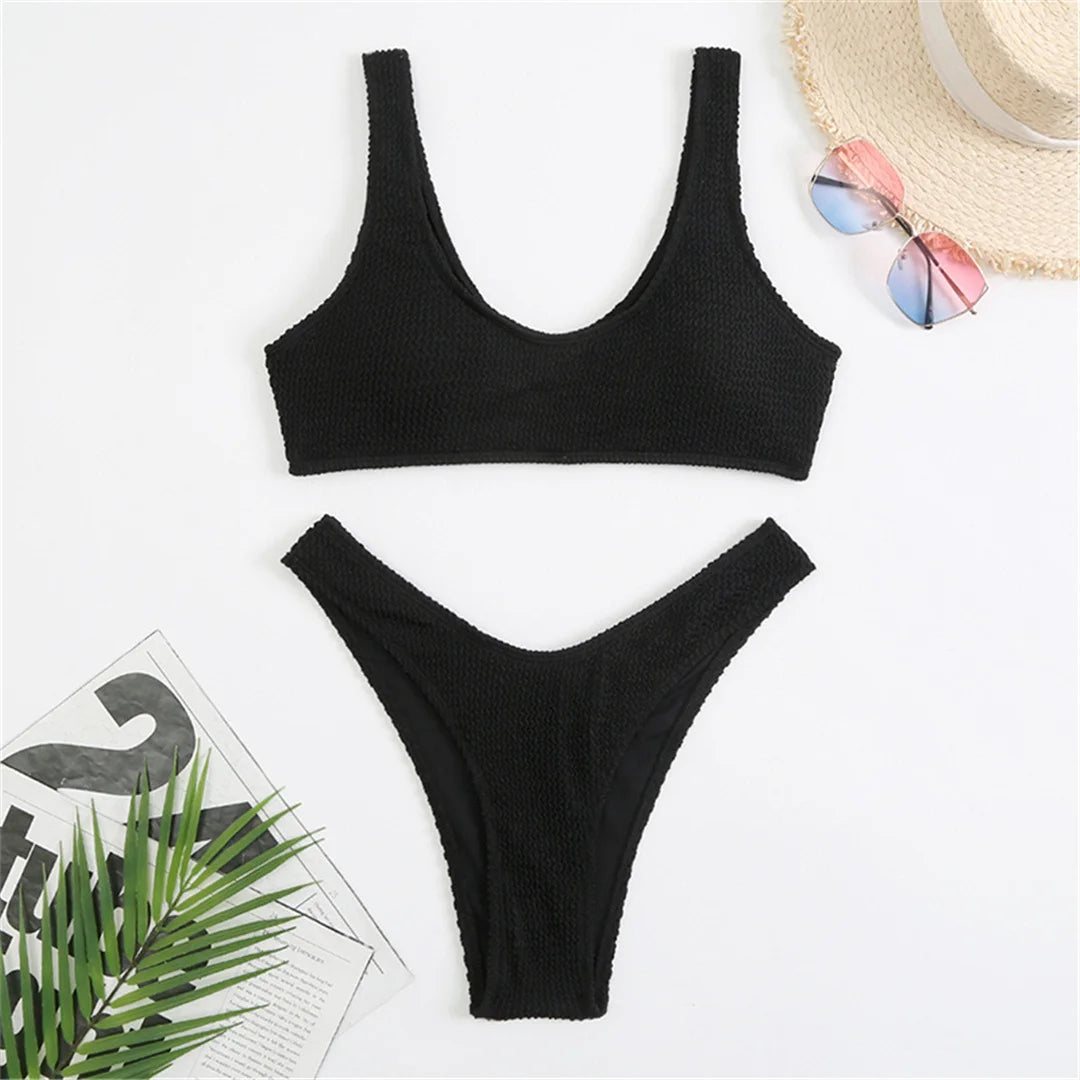 High cut bikini set in eight colors with wrinkled crinkled texture and solid design for a chic and flattering fit.