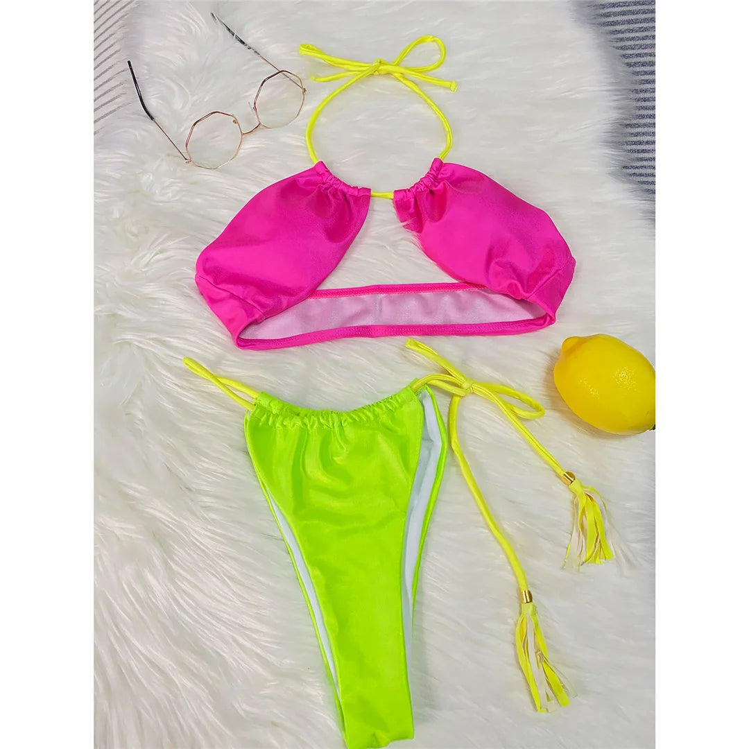 Bold halter bikini set in neon satin, featuring high-cut bottoms and wire-free support, crafted from nylon and spandex, offering a comfortable and flattering fit, perfect for women's beach and pool style.