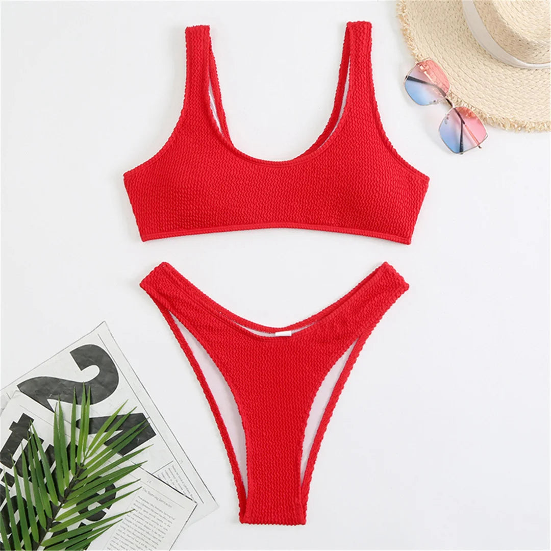 High cut bikini set in eight colors with wrinkled crinkled texture and solid design for a chic and flattering fit.