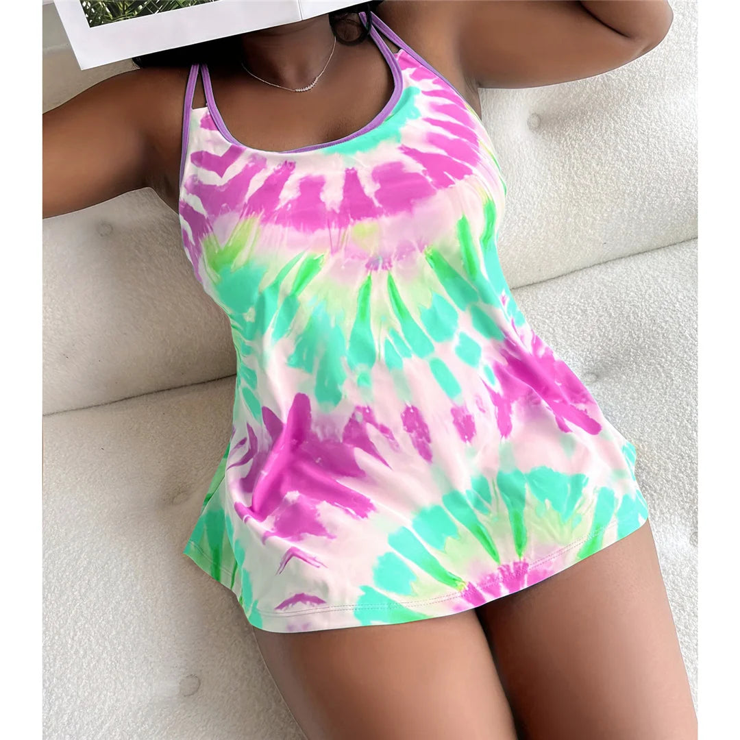 Ensemble bikini deux pièces tie-dye pour femmes, tailles allant de 0XL à 4XL. Idéal pour celles qui recherchent un look élégant à la plage ou à la piscine, ce bikini à taille haute associe un design branché à une coupe confortable. Fabriqué en nylon et spandex très extensibles, il est doté d'un soutien et d'un rembourrage sans fil. Disponible en violet et en bleu lac pour toutes les saisons de natation à la mode.