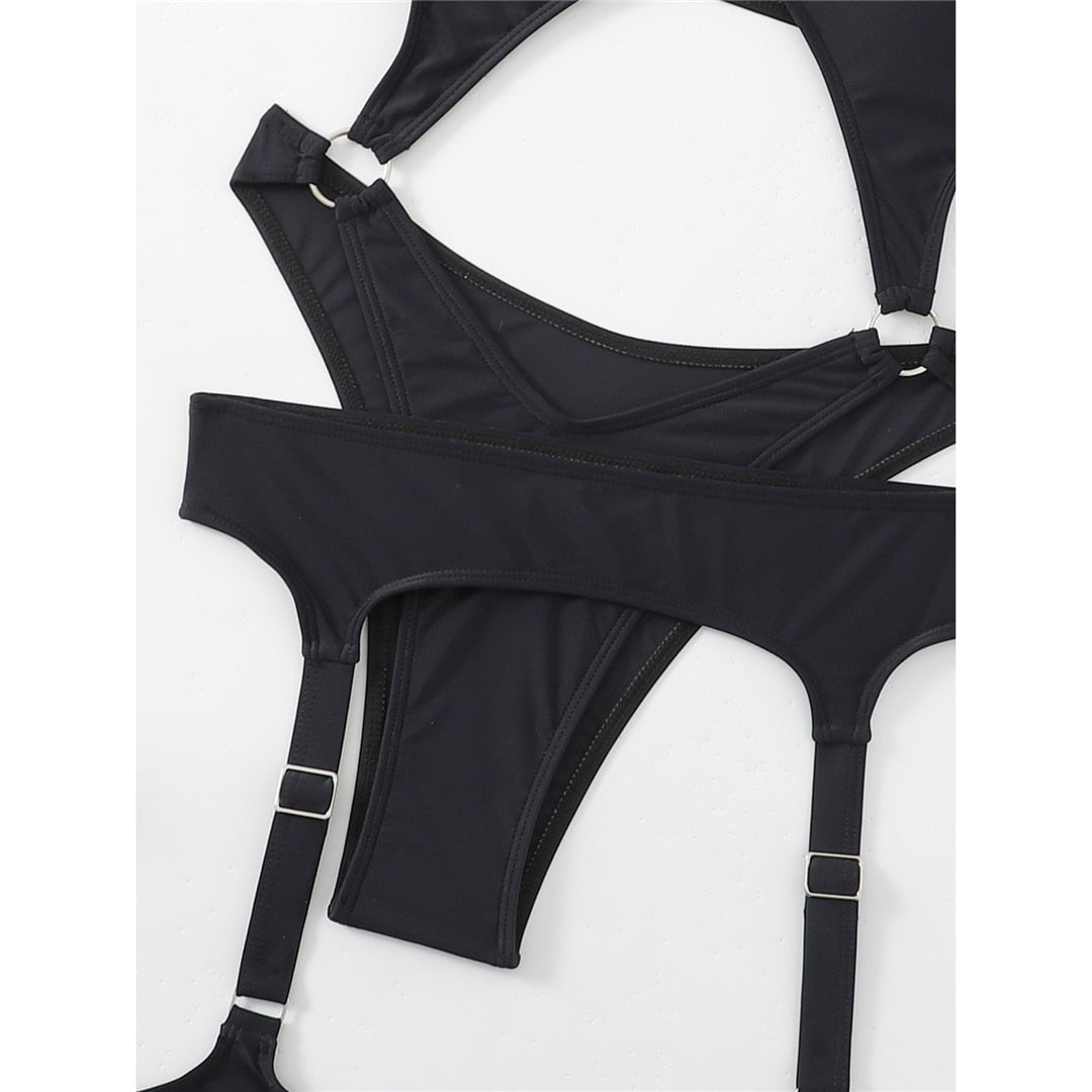 Maillot de bain une pièce avec découpe du ventre et jarretière