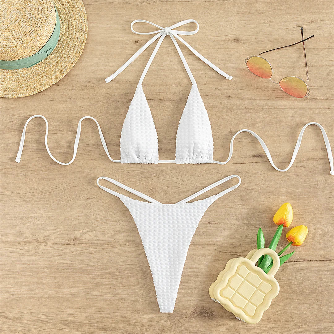 Chic Wrinkled Halter Mini Bikini Set For Women, Made Of Nylon And Spandex, Featuring A Flattering Ruched Fabric With A Daring Mini Thong Cut, Fits True To Size, Wire-Free Support, Low Waist, Comes With Pad, Solid Pattern, Available In White, New Condition, In Stock With Free Shipping, Ideal For Ages 18 To 35 And Adults