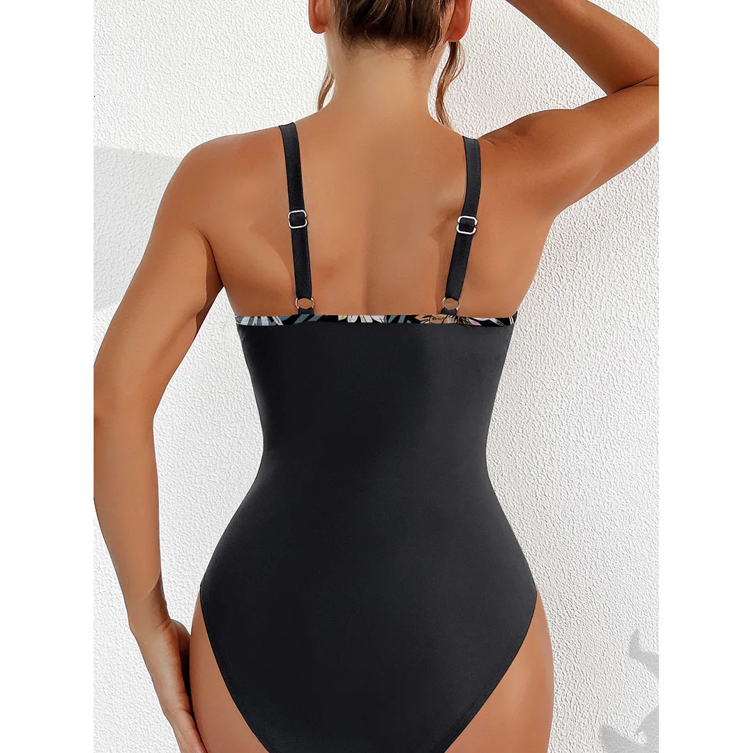 Mesh Sheer V Neck Leopard Printed One Piece Swimsuit available in sizes S to XL. Made of Nylon and Spandex, this one-piece swimsuit or monokini features sheer mesh detailing and a bold leopard print. With its deep V neck and flattering silhouette, it is perfect for making a striking impression at the pool or beach. Available in Black, Deep Blue, Hot Pink, Red, White, Dark Green, Green, Leaves, Leopard, and Multicolor.