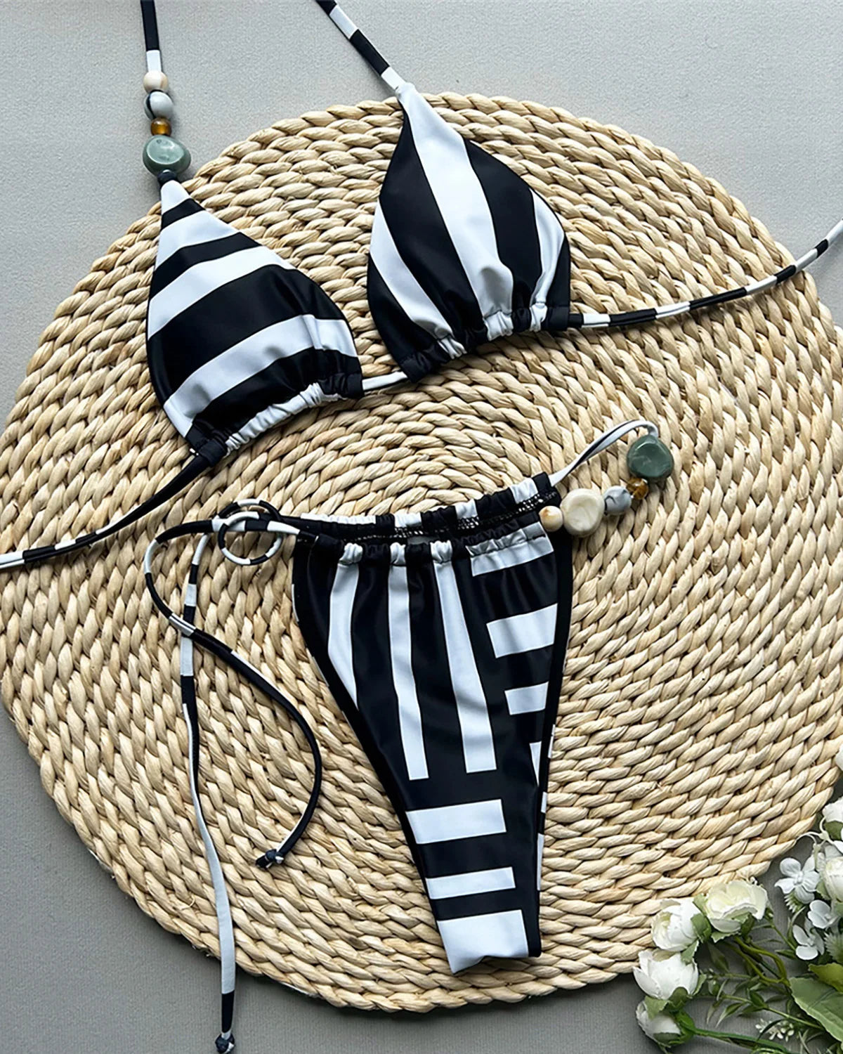 Halter striped high leg bikini set with padded design for a chic and nautical look for women.