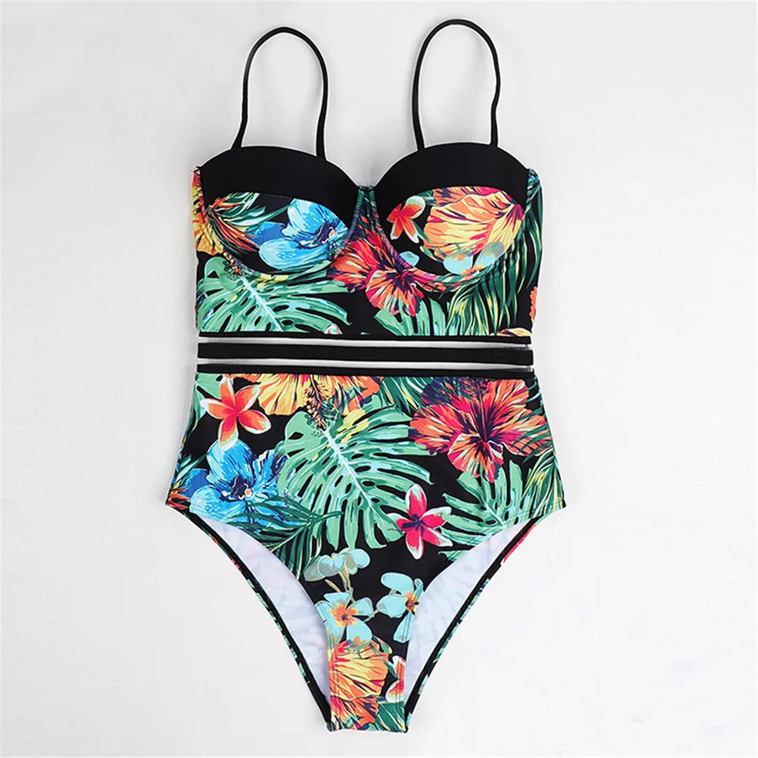 Leaves printed monokini with vibrant leaf pattern and underwire support in green, crafted from nylon and spandex.