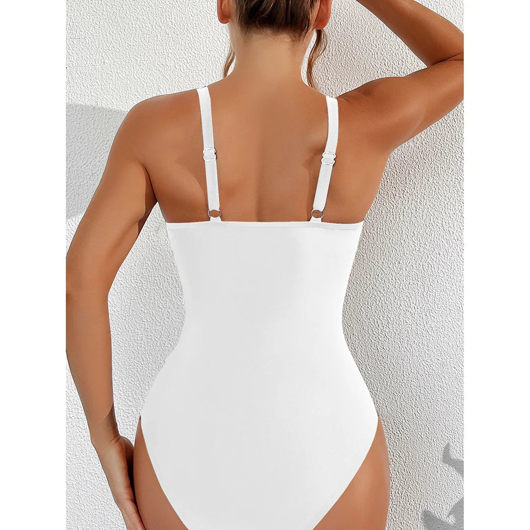 Mesh Sheer V Neck Leopard Printed One Piece Swimsuit available in sizes S to XL. Made of Nylon and Spandex, this one-piece swimsuit or monokini features sheer mesh detailing and a bold leopard print. With its deep V neck and flattering silhouette, it is perfect for making a striking impression at the pool or beach. Available in Black, Deep Blue, Hot Pink, Red, White, Dark Green, Green, Leaves, Leopard, and Multicolor.