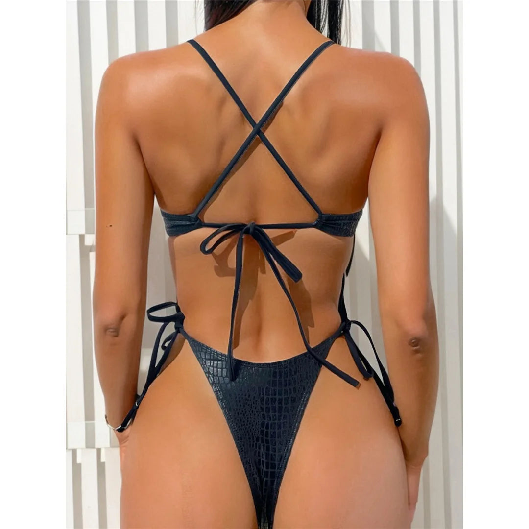 Asymmetric snake skin cut-out one-piece swimsuit, high-cut design, cross back, adjustable triangle top, polyester spandex blend, monochrome solid pattern, women's chic and daring swimwear.