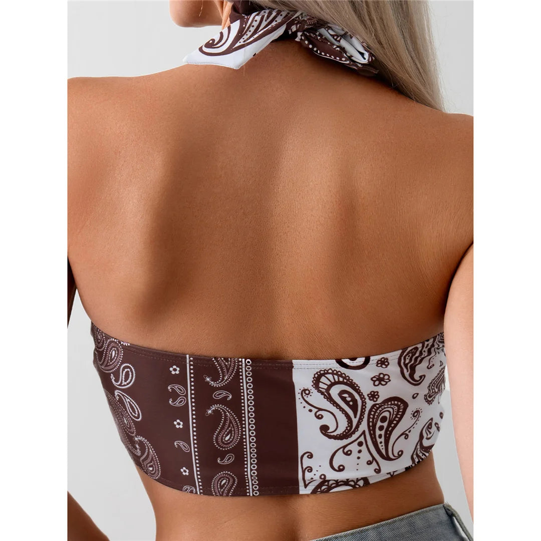 Printed splicing halter knotted bikini top with unique print combination in brown and white, made from polyester and spandex.