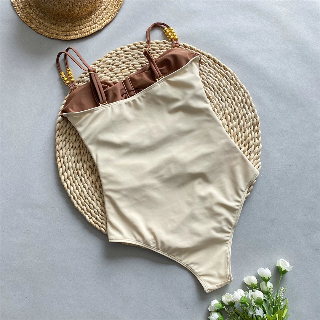 Costume da bagno intero con gonnellino annodato, Monokini con texture stropicciata, Realizzato in nylon e spandex, motivo patchwork, supporto senza fili, misura fedele, Costume da bagno per donna, Viene fornito con imbottitura, Disponibile nelle taglie small, medium, large e extra large, Colori disponibili: Verde, Nero, Rosa, Marrone, Multicolore, Spedizione gratuita.