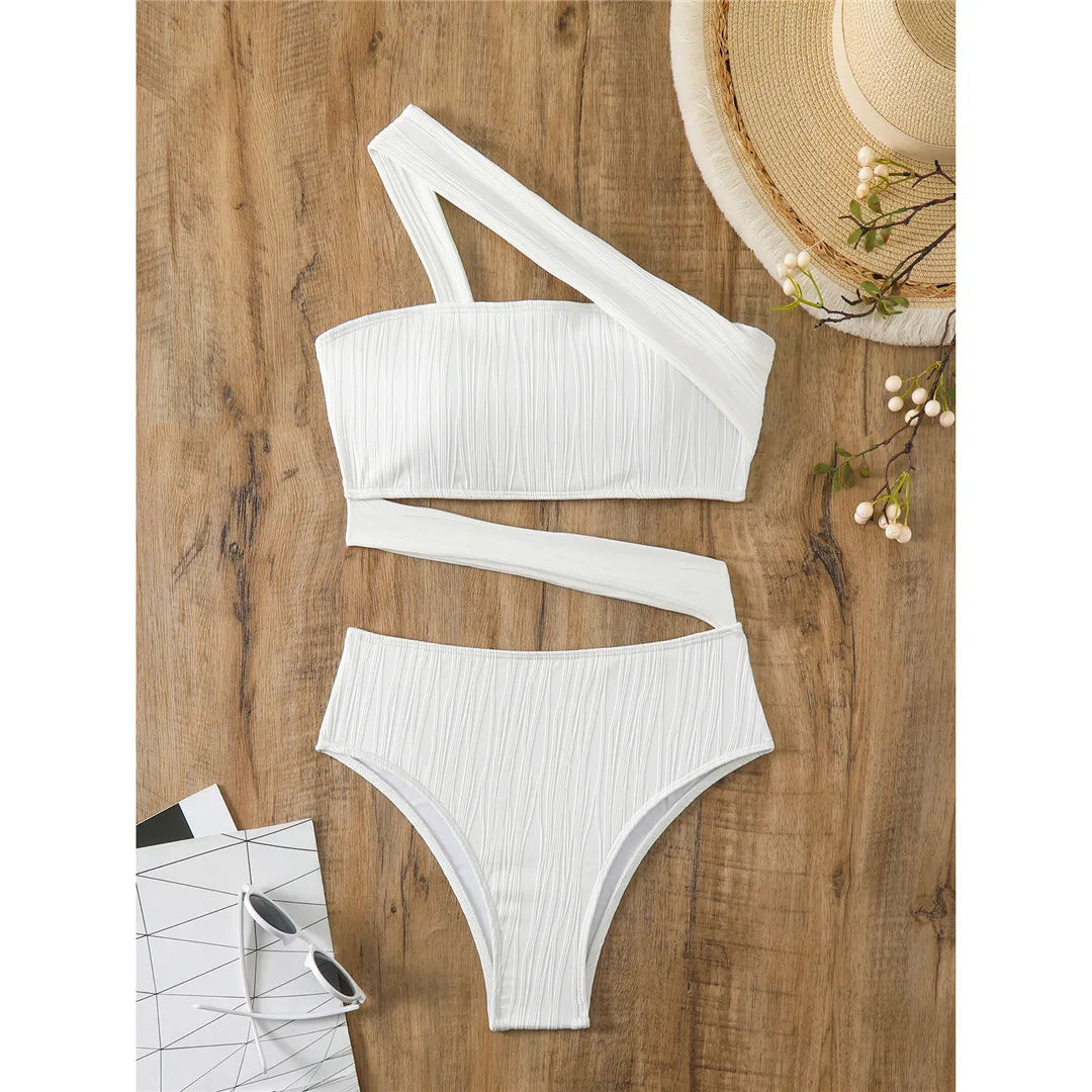 Statement Asymmetric One-Shoulder Cut-Out One-Piece Swimsuit with High Leg Cut in White, Made from Nylon and Spandex, Features Pad for Additional Support, Ideal for Fashion-Forward Women, Available in Sizes S to L