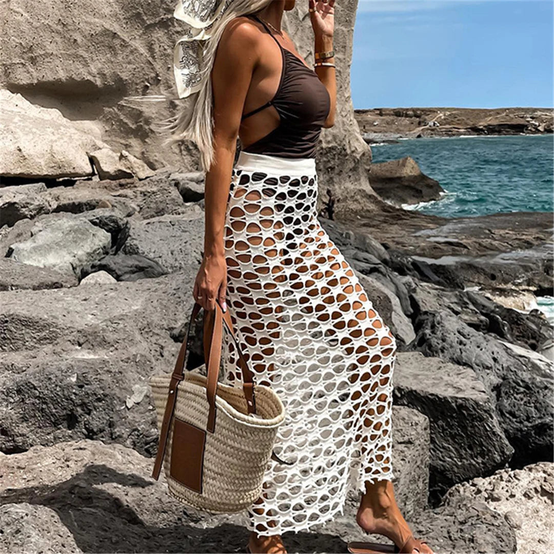 Delicata tunica trasparente all'uncinetto per donna, con motivo a buchi e struttura a maglia, ideale per coprirsi in spiaggia, corrisponde alla taglia, disponibile nelle taglie dalla S alla XL, Materiale: Nylon, Poliestere, Cotone, Modello a tinta unita, Perfetto per una miscela di fascino e artigianalità, Colore bianco