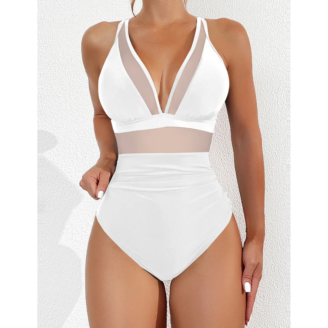 Mesh Sheer V Neck Leopard Printed One Piece Swimsuit available in sizes S to XL. Made of Nylon and Spandex, this one-piece swimsuit or monokini features sheer mesh detailing and a bold leopard print. With its deep V neck and flattering silhouette, it is perfect for making a striking impression at the pool or beach. Available in Black, Deep Blue, Hot Pink, Red, White, Dark Green, Green, Leaves, Leopard, and Multicolor.