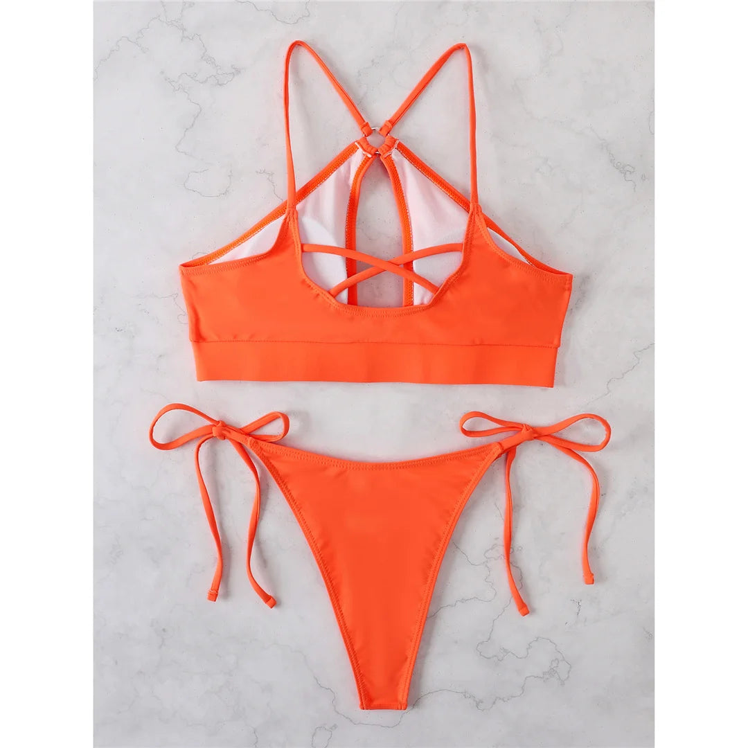 Sun-kissed Cut-Out Halter Bikini Set, Figure-Flattering Design, Supportive Padded Top, Chic Strappy Details, Mix-and-Match Two-Piece Set, Material Nylon Spandex, Solid Pattern, Wire Free, Low Waist, Bikini Set for Women, Fits True to Size, Available in Royal Blue, Hot Pink, Neon Yellow, Black, Orange