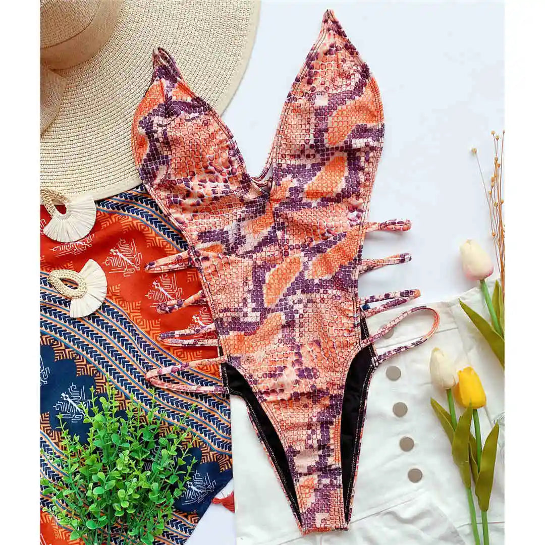 Snake Skin Monokini, High Cut One-Piece Swimsuit with Deep V Neckline, Made of Nylon and Spandex, Vibrant Snake Print, Wire-Free Support, True to Size, Women's Swimwear, Comes with Padding, Available in Sizes Small, Medium, and Large, Colors Available: Green, Blue, Snake Print, Orange, Multicolor, Free Shipping.