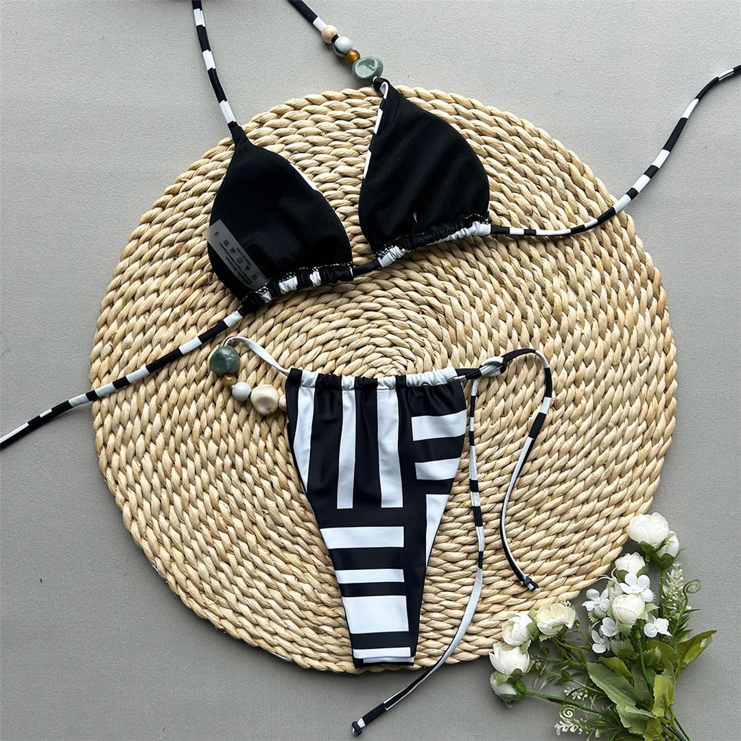 Halter striped high leg bikini set with padded design for a chic and nautical look for women.