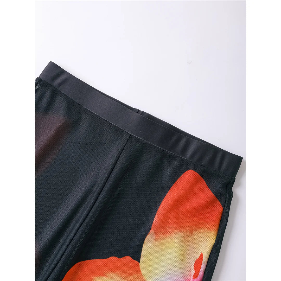 Floral Printed Bikini Set with Pants featuring vibrant prints, low waist bottoms, coordinating pants for versatility, perfect for stylish beach transitions.