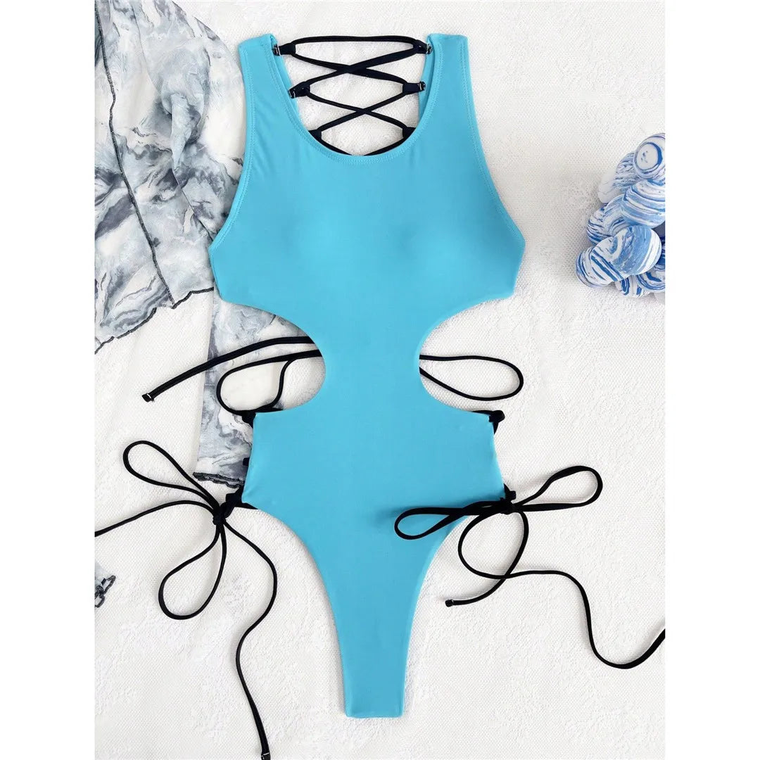 Cut-out lace-up strappy one-piece swimsuit, high leg backless design, racerback style, polyester spandex blend, monochrome solid pattern, adjustable straps, women&#39;s swimwear.