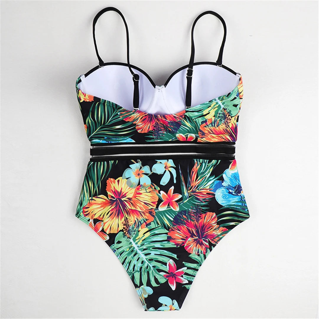 Leaves printed monokini with vibrant leaf pattern and underwire support in green, crafted from nylon and spandex.