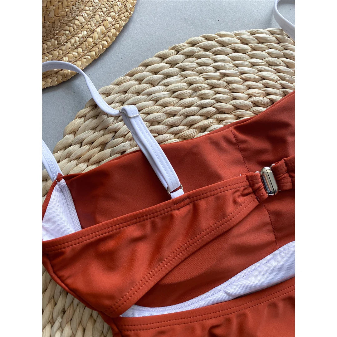 Elegant Splicing High Leg Cut One-Piece Monokini in Brown, Made of Nylon and Spandex with Patchwork Pattern, Includes Pad for Support, Ideal for Women, Available in Sizes S to L, Combines Timeless Style and Modernity