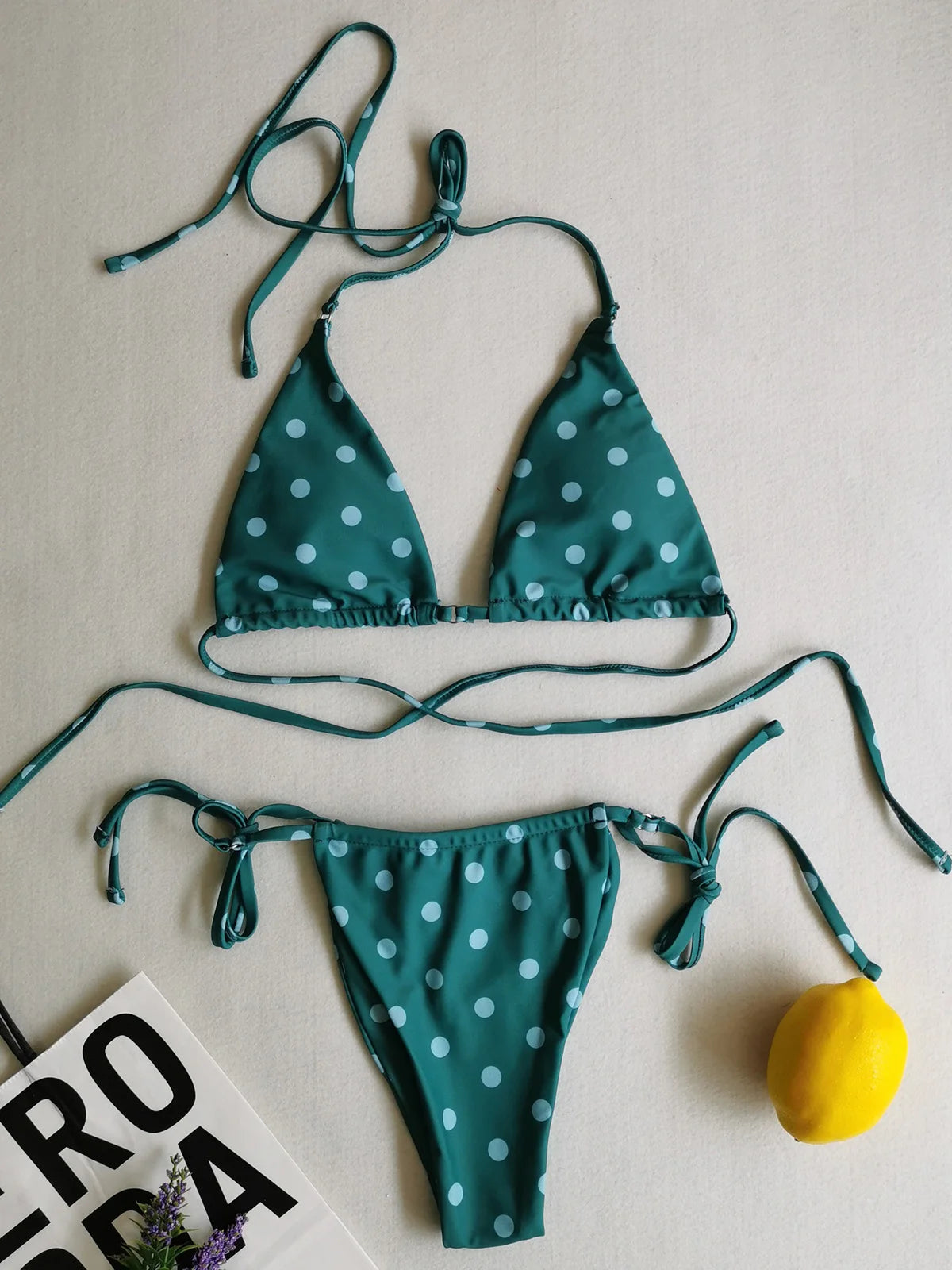 Two-Piece Polka Dot and Floral Bikini Set with a Halter Neck Design, Available in Sizes S through XL, Fashioned from Nylon and Spandex, Suitable for Women, Wire Free with Low Waist Design, Comes with Pad, Fits True to Size. Comes in Multiple Colors such as Yellow, Multicolor, Wheat, Pink, Watermelon Red, Red, Black, Blue, Coffee, Green, Orange, Purple, and in Different Patterns like Flowers, Dots, Plaid, Diamond, and Printed Design.