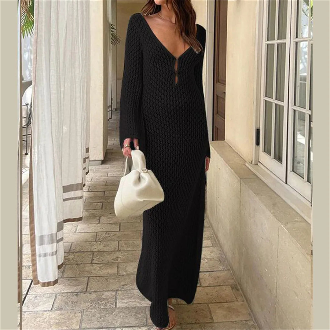 Bohemian-style long sleeve crochet tunic perfect for beach cover-up. This V-neck tunic is available in five colors - Coffee, White, Light Blue, Black, and Yellow. Made from nylon, polyester, rayon, and cotton, its knitted design provides coverage and breathability. Fits true to size and is the perfect companion for any swimwear ensemble.